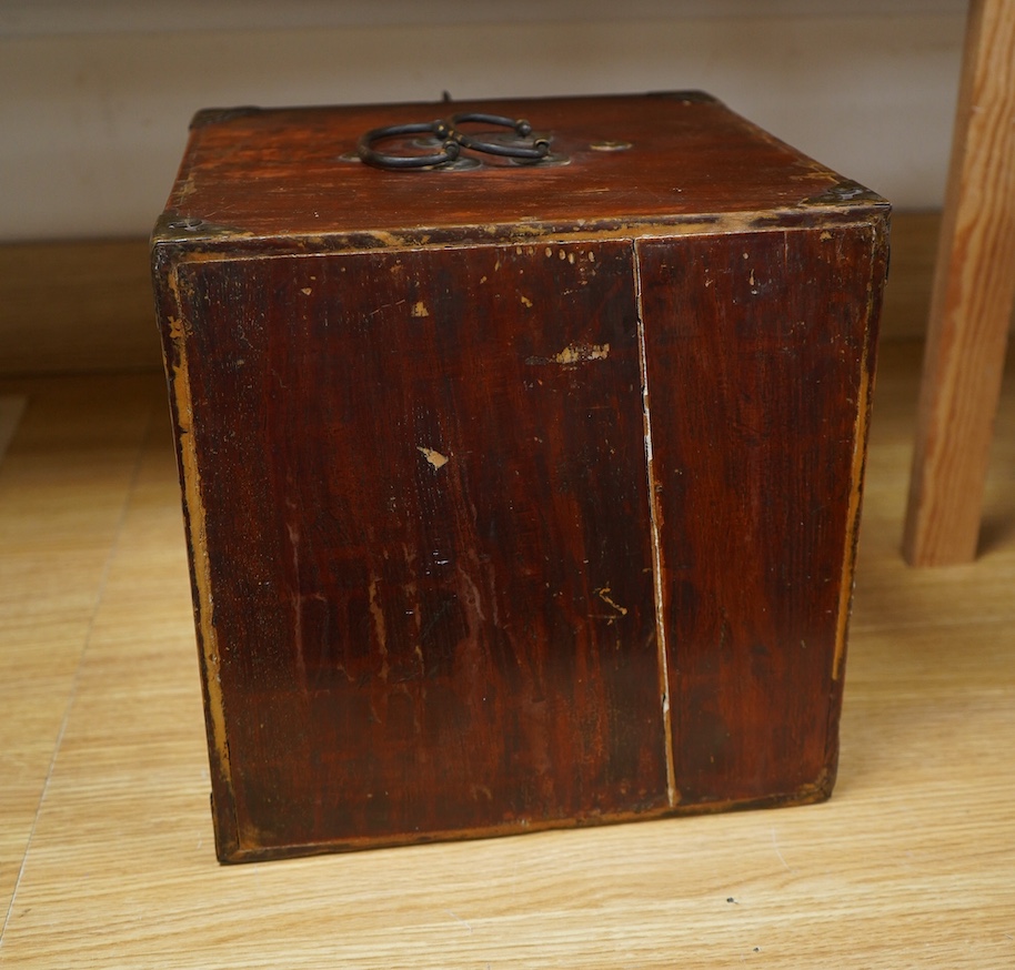 A 19th century Chinese elm scholar's seal cabinet with key, 31cm high. Condition - fair